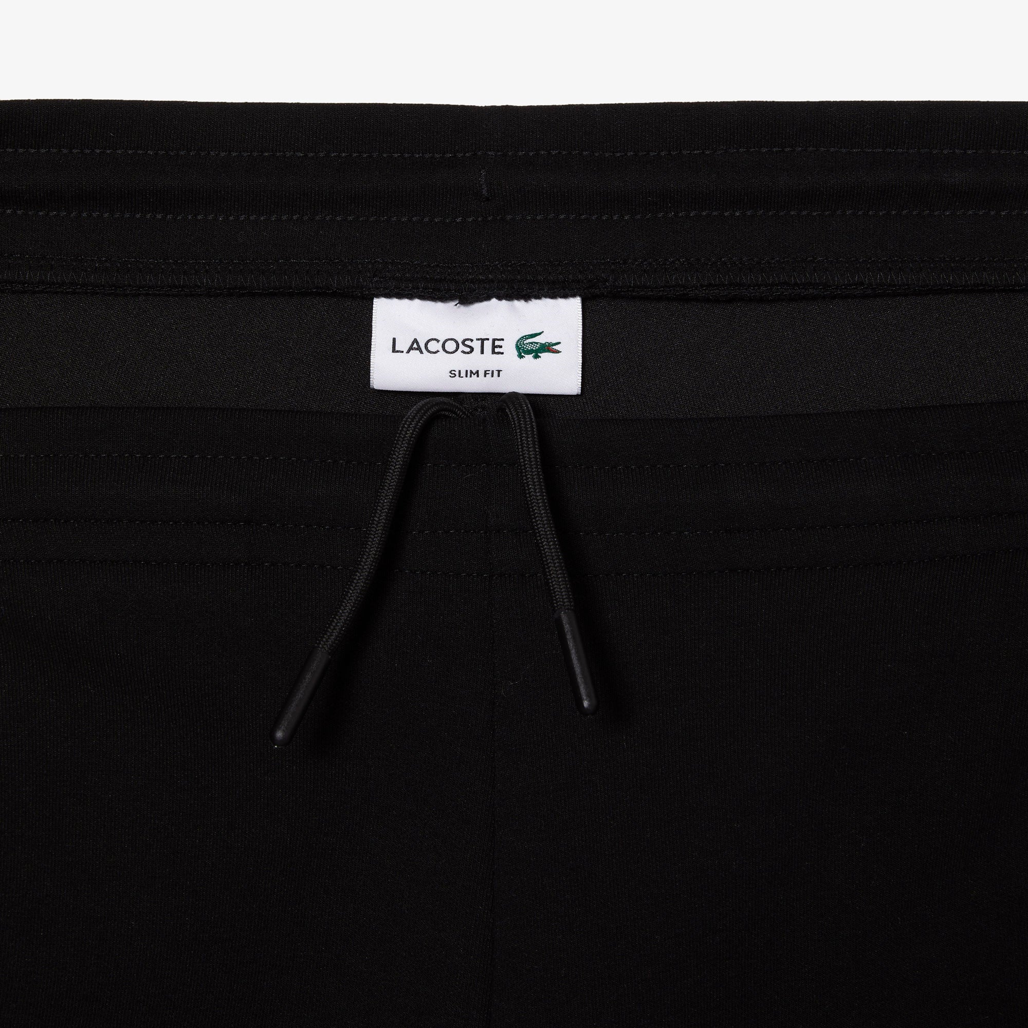 LACOSTE Pantaloni Tuta Uomo Nero