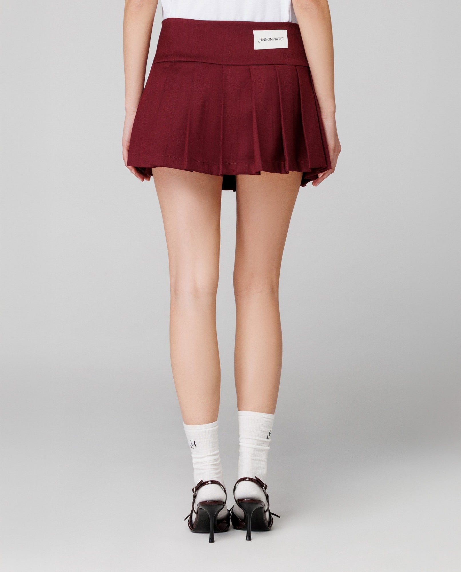 HINNOMINATE Gonna Donna Corta Pieghe con Pantaloncino-Bordeaux