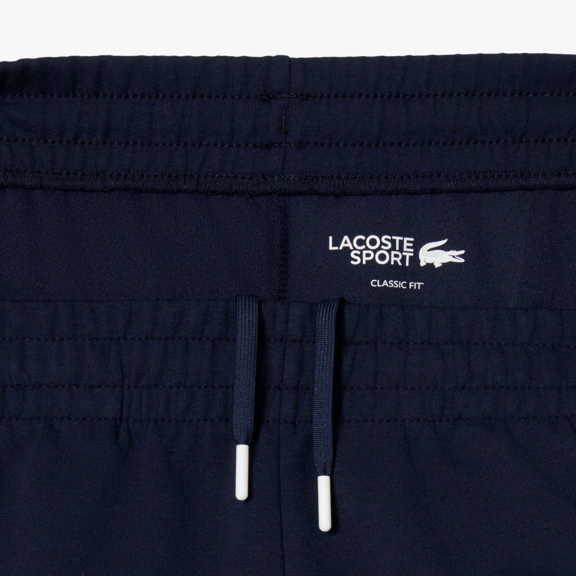 LACOSTE Pantalone Tuta Uomo Banda Logo-Blu Navy