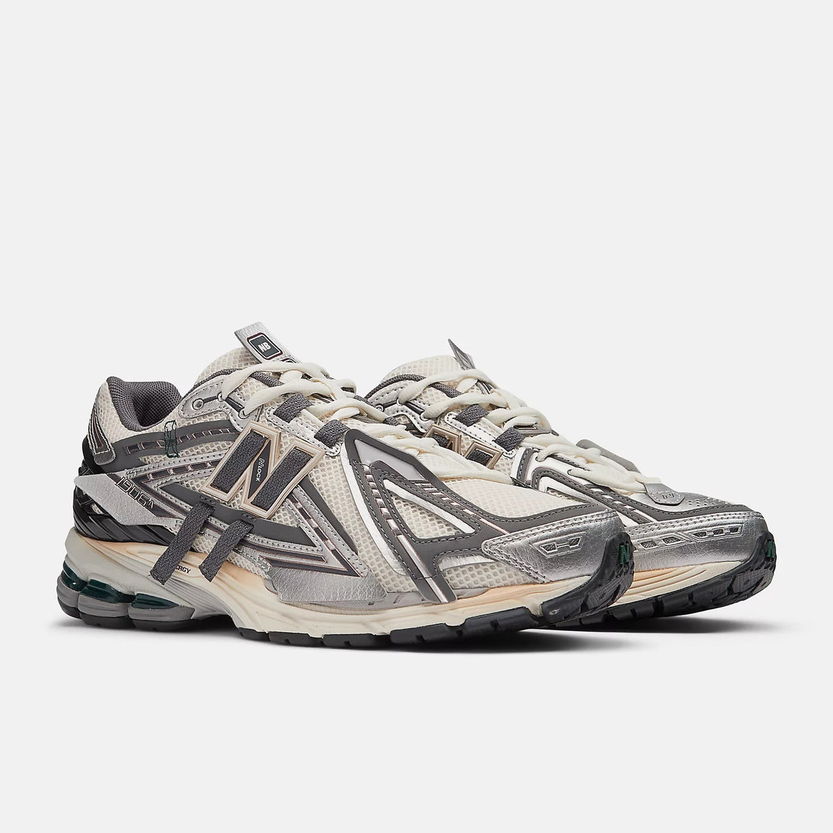 NEW BALANCE Sneaker Unisex 1906A-Silver Metallic/Castlerock/Gold Metallic