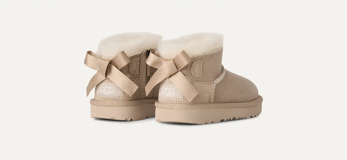 UGG Scarponcino Bambina ULTRA MINI BAILEY BOW 1185920T-Sand
